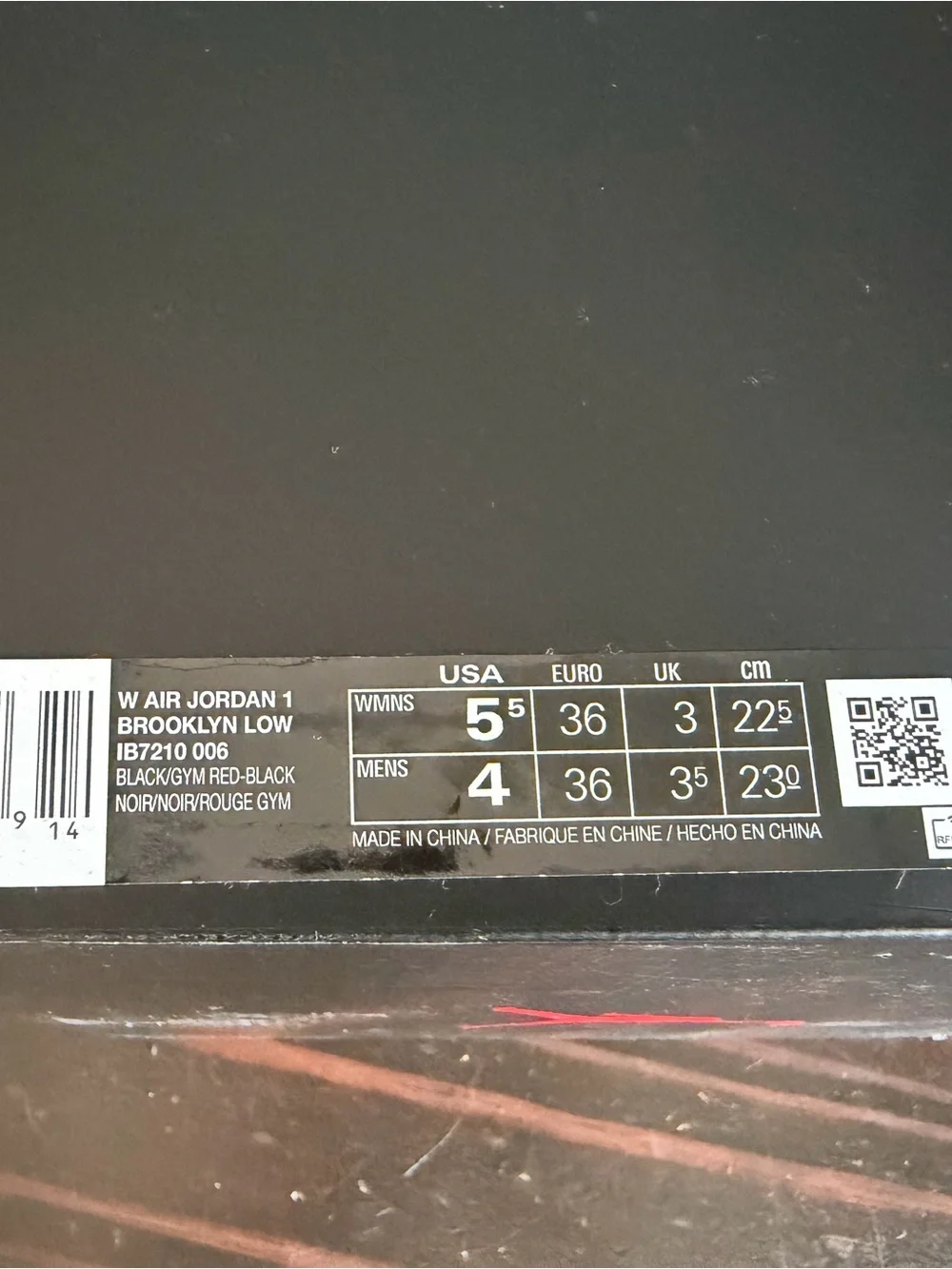 Jordan WMNS Platform Air Jordan 1 Low in Black with Red Logo